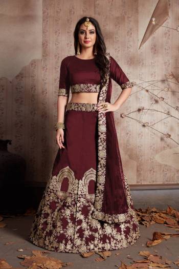 This set features a dark Maroon Color Velvet silk dori work lehenga choli set. It comes along with stone work on dupatta and heavy embroidery work on lehenga. Matching blouse with short sleeves.
