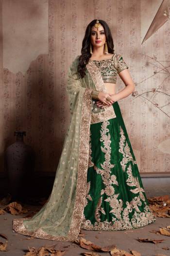 This set features a Dark Green semi velvet dori work lehenga choli set. It comes along with zari and dori lace work on dupatta and heavy embroidery butta on dupatta. Matching blouse with heavy dori work and zari work.