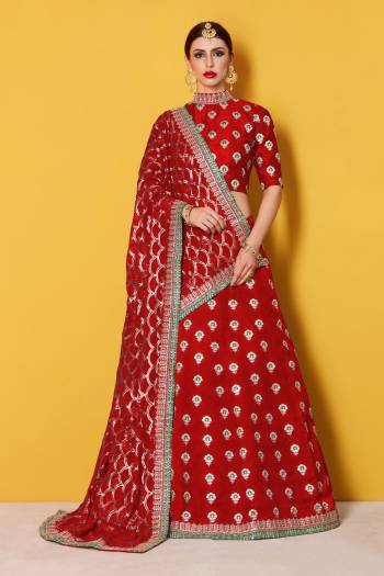 This set features a red art silk zari work lehenga choli set. It comes along with zari and dori lace 
work on dupatta and heavy embroidery sequins work on dupatta. Matching blouse with heavy zari work butti.