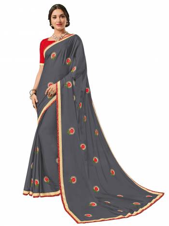 Flaunt a new ethnic look wearing this grey color bright georgette saree. this party wear saree won't fail to impress everyone around you. this gorgeous saree featuring a beautiful mix of designs. Its attractive color and designer heavy embroidered design, Flower patch design, beautiful floral design work over the attire & contrast hemline adds to the look. Comes along with a contrast unstitched blouse.