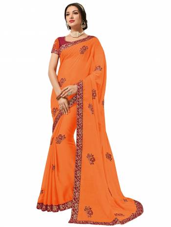 you Look striking and stunning afler wearing this orange color chiffon pattern saree. look gorgeous at an upcoming any occasion wearing the saree. this party wear saree won't fail to impress everyone around you. Its attractive color and designer heavy embroidered design, Flower patch design, beautiful floral design work over the attire & contrast hemline adds to the look. Comes along with a contrast unstitched blouse.