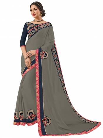 Presenting this grey color moss chiffon saree. look gorgeous at an upcoming any occasion wearing the saree. this party wear saree won't fail to impress everyone around you. Its attractive color and designer heavy embroidered design, Flower patch design, stone design, beautiful floral design work over the attire & contrast hemline adds to the look. Comes along with a contrast unstitched blouse.