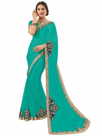 Show your elegance by wearing this gorgeous Sea green color moss chiffon saree. Ideal for party, festive & social gatherings. this gorgeous saree featuring a beautiful mix of designs. Its attractive color and designer heavy embroidered design, Flower patch design, stone design, beautiful floral design work over the attire & contrast hemline adds to the look. Comes along with a contrast unstitched blouse.