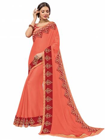 Gorgeously mesmerizing is what you will look at the next wedding gala wearing this beautiful Orange color bright chiffon saree. Ideal for party, festive & social gatherings. this gorgeous saree featuring a beautiful mix of designs. Its attractive color and designer heavy embroidered design, Flower patch design, stone design, beautiful floral design work over the attire & contrast hemline adds to the look. Comes along with a contrast unstitched blouse.