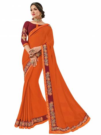 You Look elegant and stylish this festive season by draping this orange color moss chiffon saree. Ideal for party, festive & social gatherings. this gorgeous saree featuring a beautiful mix of designs. Its attractive color and designer heavy embroidered design, Flower patch design, stone design, beautiful floral design work over the attire & contrast hemline adds to the look. Comes along with a contrast unstitched blouse.