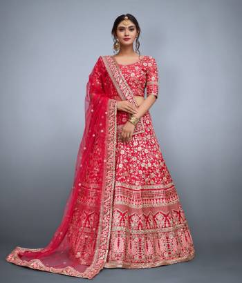 This set features Dark pink floral resham work with sequins embellished on art silk base. It comes along with matching Dark pink blouse and sequins embellished on it. It is paired with soft net butti work in sequins and heavy lace work on it.