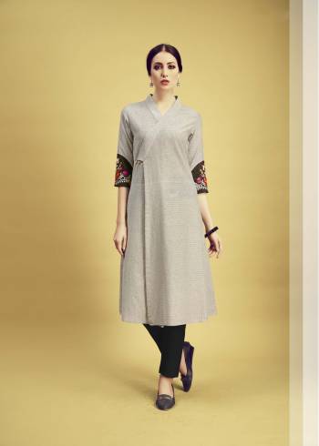 For Your Casual, Semi-Casual, Office Wear. Grab This Pretty Elegant Looking Readymade Kurti In Light Grey Color Fabricated On Cotton. It Is Beautified With Prints And Multi Colored Thread Work Over The Sleeves. 