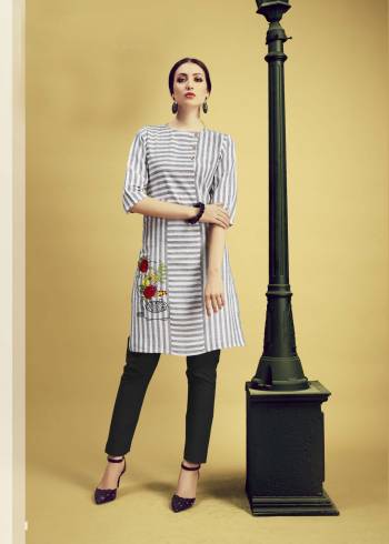 Elegant Looking Kurti Is Here That Can Be Paired With Leggings Or Even Denim. Its Fabricated on Cotton Beautified With Multi Colored Floral Thread Work. Buy This Kurti Now.