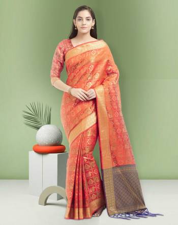 Orange Color Induces Perfect Summery Appeal To Any Outfit, So Grab This Saree In Orange Color Paired With Dark Peach Colored Blouse. This Saree And Blouse are Fabricated On Art Silk Beautified With Weave. 