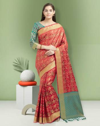 Orange Color Induces Perfect Summery Appeal To Any Outfit, So Grab This Saree In Orange Color Paired With Turquoise Blue Colored Blouse. This Saree And Blouse are Fabricated On Art Silk Beautified With Weave. 