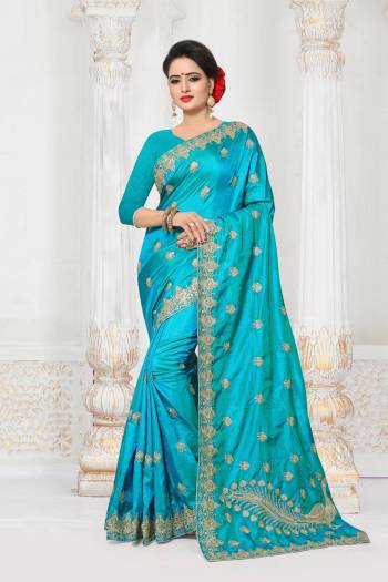 Grab This Pretty Saree In Turquoise Blue Color Paired With Turquoise Blue Colored Blouse. This Saree And Blouse are Fabricated On Art Silk Beautified With Heavy Jari Embroidery And Stone Work.