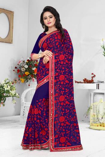 Enhance Your Personality Wearing This Heavy Embroidred Designer Saree In Navy Blue Color Paired With Navy Blue Colored Blouse. This Saree And Blouse Are Fabricated On Georgette Beautified With Contrasting Red Colored Thread Work. Buy Now.