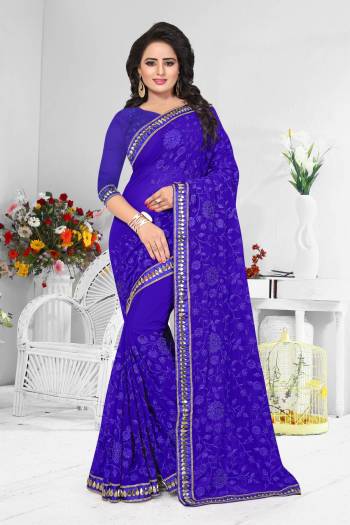 With A Bight Look Grab This Royal Blue Colored Georgette Based Saree Beautified With Heavy Tone To Tone Resham Embroidery With Stone Work.