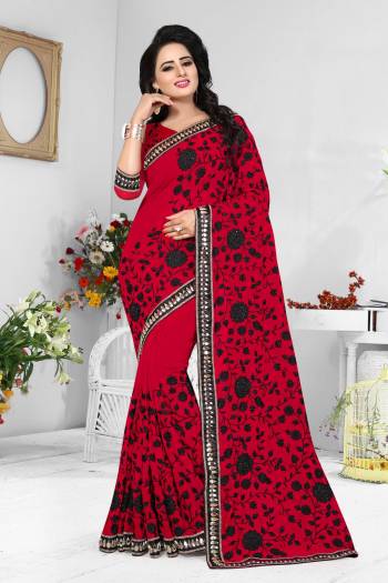 Adorn The Angelic Look Wearing This Saree In Red Paired With Red Colored Blouse. It Is Georgette Fabricated Beautified With All Over Black Colored Resham Embroidery.