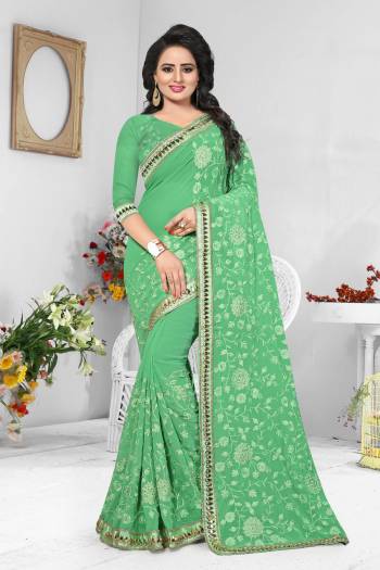 Here Is A Very Pretty Saree In Light Green Color Paired With Light Green Colored Blouse, This Saree And Blouse are Georgette Fabricated Beautified with Heavy Resham Same Tone Embroidery. Buy this Saree Now.