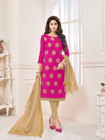 Shine bright in this dress material with rani pink colored top paired with beige colored bottom and dupatta. Its top and bottom are fabricated on cotton paired with chanderi dupatta. It is beautified with thread embroidered motifs all over the top. Buy this dress material now.