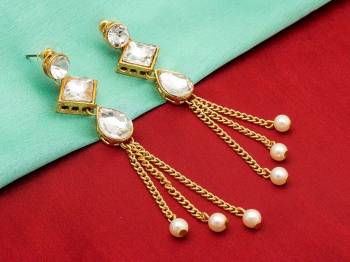 Be It A Simple Kurti Or Heavy Dress, This Pretty Elegant Earrings Set Is Suitable For Both, Grab This Lovely Set Of Earrings Beautified With White Colored Stones And Pearls. Buy Now.