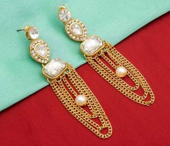 Be It A Simple Kurti Or Heavy Dress, This Pretty Elegant Earrings Set Is Suitable For Both, Grab This Lovely Set Of Earrings Beautified With White Colored Stones And Pearls. Buy Now.