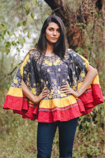 Navy blue and red khadi poncho with floral embroidery embilished with nylon tassel lace amd multi weaved lace. Attached with mustured and red frill all over the poncho