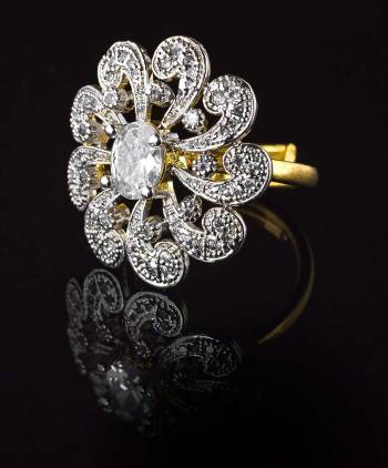 Give A Very Pretty Look To Your Soft Beautiful Hands With This Lovely Designer Ring In Golden Color Beautified With Lovely Diamond Work. This Pretty Ring Can Be Paired With Any Colored Attire. Buy Now.