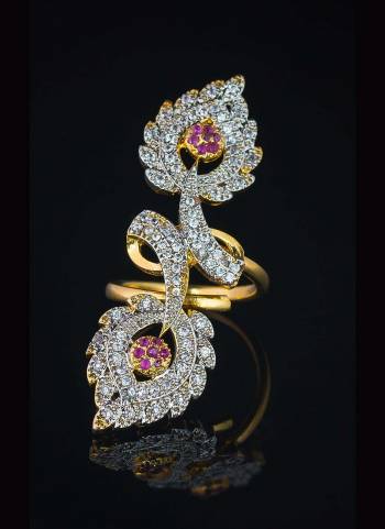 Give A Very Pretty Look To Your Soft Beautiful Hands With This Lovely Designer Ring In Golden Color Beautified With Lovely Diamond Work. This Pretty Ring Can Be Paired With Any Colored Attire. Buy Now.