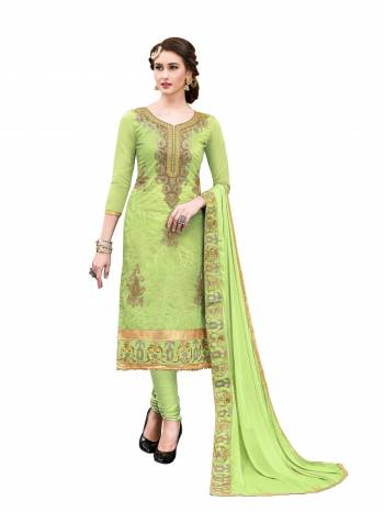 Grab This Pretty Dress Material In Light Green Color Paired With Light Green Colored Bottom And Dupatta. Its Top And Bottom Are Cotton Based Paired With Chiffon Dupatta. Buy This Dress Material Now.