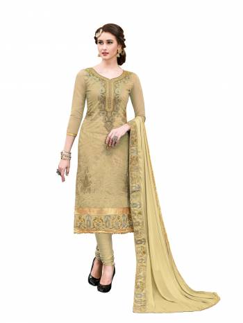 Flaunt Your Rich And Elegant Taste Wearing This Dress Material In Beige Color Paired With Beige Colored Bottom And Dupatta. Its Top And Bottom Are Fabricated On Cotton Paired With Chiffon Dupatta. 