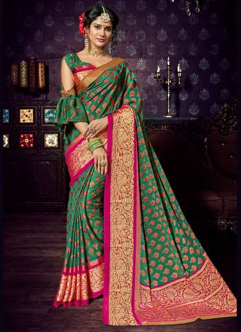 Celebrate This Festive Season Wearing This Saree In Green Color Paired With Green Colored Blouse. This Has Base With Chiffon Brasso Paired With Jacquard Silk Fabricated Blouse. Both The Fabrics Are Light Weight And Easy To Carry All Day Long.