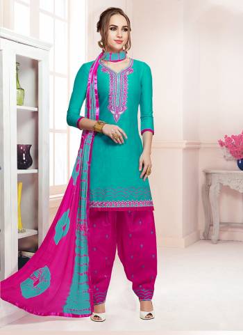 Add This Pretty Dress Material To Your Wardrobe In Turquoise Blue Colored Top Paired WithRani Pink Colored Bottom And Dupatta. Its Top And Bottom Are Fabricated On Cotton Paired With Chiffon Dupatta. Buy This Now.