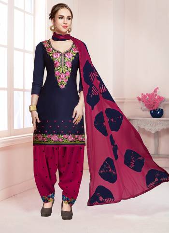 Enhance Your Personality With This Dress Material In Navy Blue Colored Top Paired With Contrasting Magenta Pink Colored Bottom And Blue And Red Dupatta. Its Top And Bottom Are Cotton Based Paired With Chiffon Dupatta. 