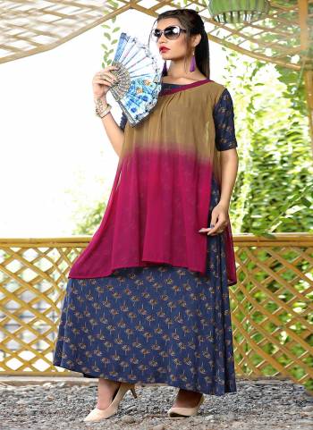 Grab This Designer Readymade Kurti In Blue Color Paired With Pink And Beige Colored Dupatta. This Kurti Is Rayon Fabricated Paired With Georgette Fabricated Dupatta. It Is Light Weight And Easy To Carry All Day Long.