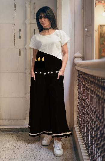 Pretty Simple Pair In Top And Pant Is Here With This White And Black Colored Top Paired With Black Colored Bottom. This Pair Is Khadi Cotton Based Which Is Suitable For All Season And Ensures Superb Comfort. Buy Now.