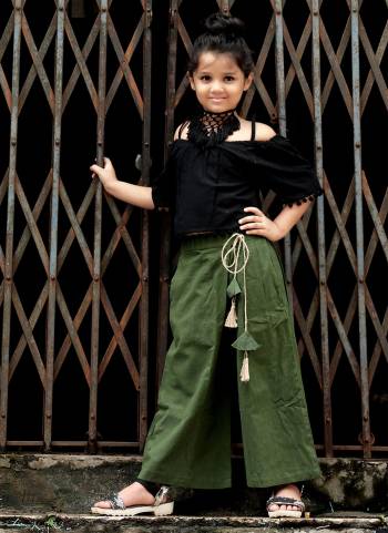 Trendy And Classy Are Two Perfect Word For Todays Generation, Grab This Beautiful Pair In Black Colored Off Shoulder Top Paired With Pine Green Colored Bottom .Both Are Khadi Cotton Based Fabric Available In Sizes. 