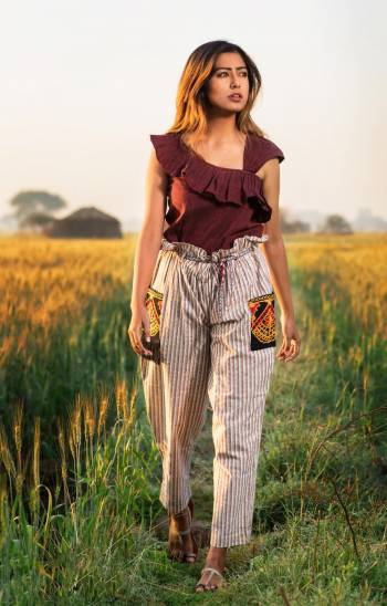 Here Is A Lovely Patterned Western Pair In Wine Colored Top Paired With Off-White Colored Pants. This Pair IS Khadi Cotton Based Fabric. Buy Now.