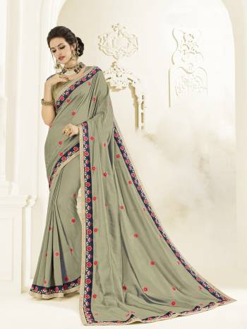 Presenting this grey color two tone silk saree. Ideal for party, festive & social gatherings. this gorgeous saree featuring a beautiful mix of designs. Its attractive color and designer heavy embroidered design, Flower patch design, stone design, beautiful floral design work over the attire & contrast hemline adds to the look. Comes along with a contrast unstitched blouse.