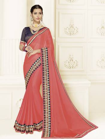 Drape this Dark Peach color two tone chiffon pattern saree. this gorgeous saree featuring a beautiful mix of designs. look gorgeous at an upcoming any occasion wearing the saree. Its attractive color and designer heavy embroidered design, Flower patch design, beautiful floral design work over the attire & contrast hemline adds to the look. Comes along with a contrast unstitched blouse.