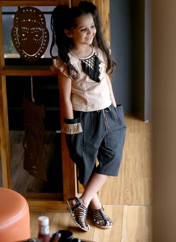 black Colored khadi  calf length pant Paired With Beige frill sleeves top with hand made tringle path lace 