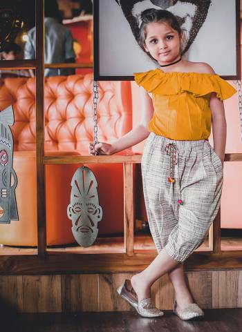 Beige Colored slub canvas khadi calf length pant Paired With Musturd Yellow  off shoulder top with 3/4th sleeves