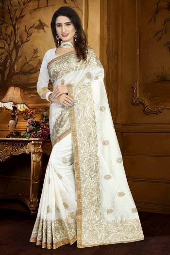 Simple And Elegant Looking Designer Silk Based Saree Is Here In White Color Paired With White Colored Blouse. This Saree Will Give An Pretty Angelic Look Like Never Before.