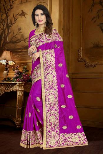 Enhance Your Perosnality Wearing This Designer Silk Saree In Magenta Pink Color Paired With Magenta Pink Colored Blouse. This Saree And Blouse are fabricated On Art Silk Beautified With Heavy Resham Embroidery And Lace Border. 