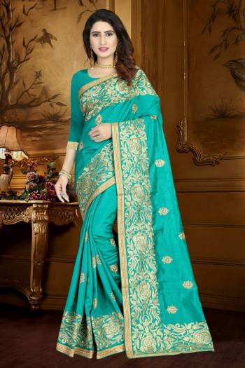 Look Pretty wearing This Designer Saree In Teal Blue Color Paired With Teal Blue Colored Blouse. This Saree And Blouse are Fabricated On Art Silk Beautified With Resham Embroidery And Lace Border.