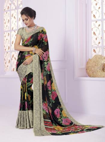 Enhance Your Beauty And Personality Wearing This Saree In Black Color Paired With Grey Colored Blouse. This Saree Is Fabricated On Georgette Paired With Crepe Fabricated Blouse, It Is Beautified with Bold Multi Colored Floral Prints.