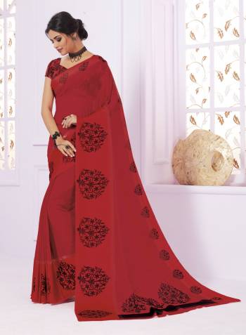 Adorn The Pretty Angelic Look Wearing This Elegant Saree In Red Color Paired With Red Colored Blouse. This Saree Is Fabricated On Georgette Paired With Crepe Fabricated Blouse. Buy This Light Weight Saree Now.