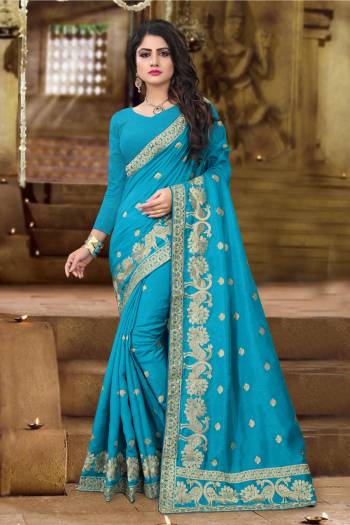 Beautiful Shade In Green Is Here With This Designer Silk Saree In Turquoise Blue color Paired with Turquoise Blue Colored Blouse, This Saree And Blouse Are Fabricated On Art Silk Beautified with Jari Embroidery. Buy This Silk Designer Saree Now.