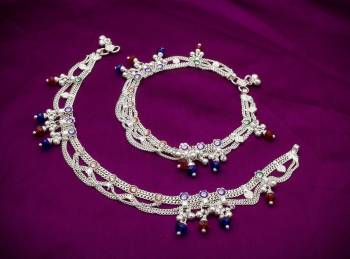 Grab This Beautiful And Attractive Anklet Set In Silver Color With Lovely Hangings All Over. This Pretty Set Will Give An Elegant Look To your Feet. Buy Now.