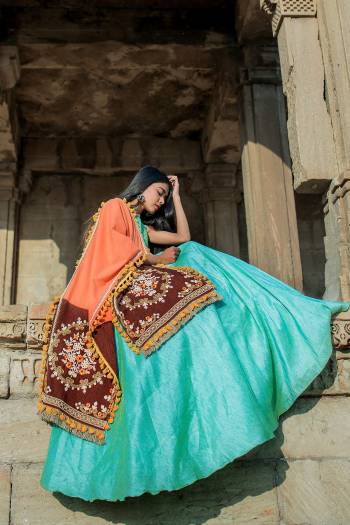 Add This Pretty Orange And Brown Color Fabricated On Khadi Cotton Beautified With Thread Work And Pom Pom Lace Border. This Dupatta Is Light Weight And Easy To Carry All Day Long.