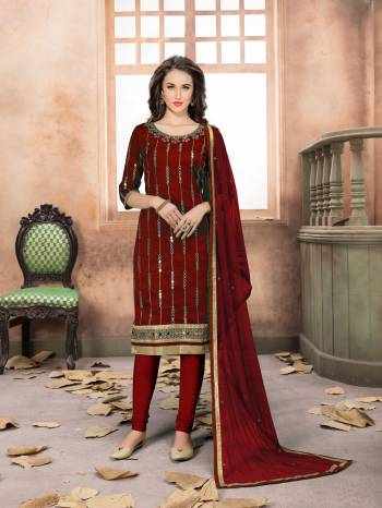 Enhance Your Personality Wearing This Designer Straight Cut Suit In Maroon Color. Its Top Is Fabricated On Art Silk Paired With Santoon Bottom And Net Dupatta. It Is Beautified With Jari Embroidery And Mirror Work. Buy Now.