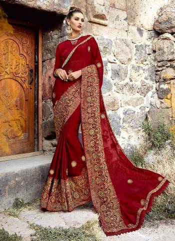 For an Enhanced Royal Look, Grab This Designer Saree In Maroon Color Paired With Maroon Colored Blouse. This Georgette Based Saree Is Piared With Art Silk Fabricated Blouse. Buy Now.