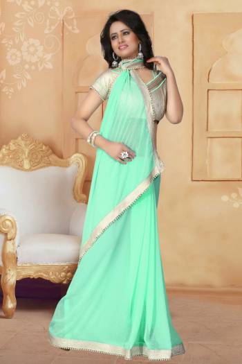 Grab This Elegant Looking Designer Saree For Your Semi-Casual Or Even Party Wear. This Saree Gives An Elegant And Simple Look Which Is Fabricated On Georgette. This Saree Is In Pastel Green Color Paired With Cream Colored Blouse. Buy This Saree Now.