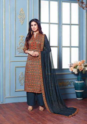 Grab This Beautiful Straight Suit In Multi Colored Top Paired With Dark Blue Colored Bottom And Dupatta. Its Top And Bottom Are Fabricated On Cotton Satin Paired With Chiffon Dupatta. It Is Beautified With Intricate Prints And Resham Embroidery On Dupatta. Buy Now.